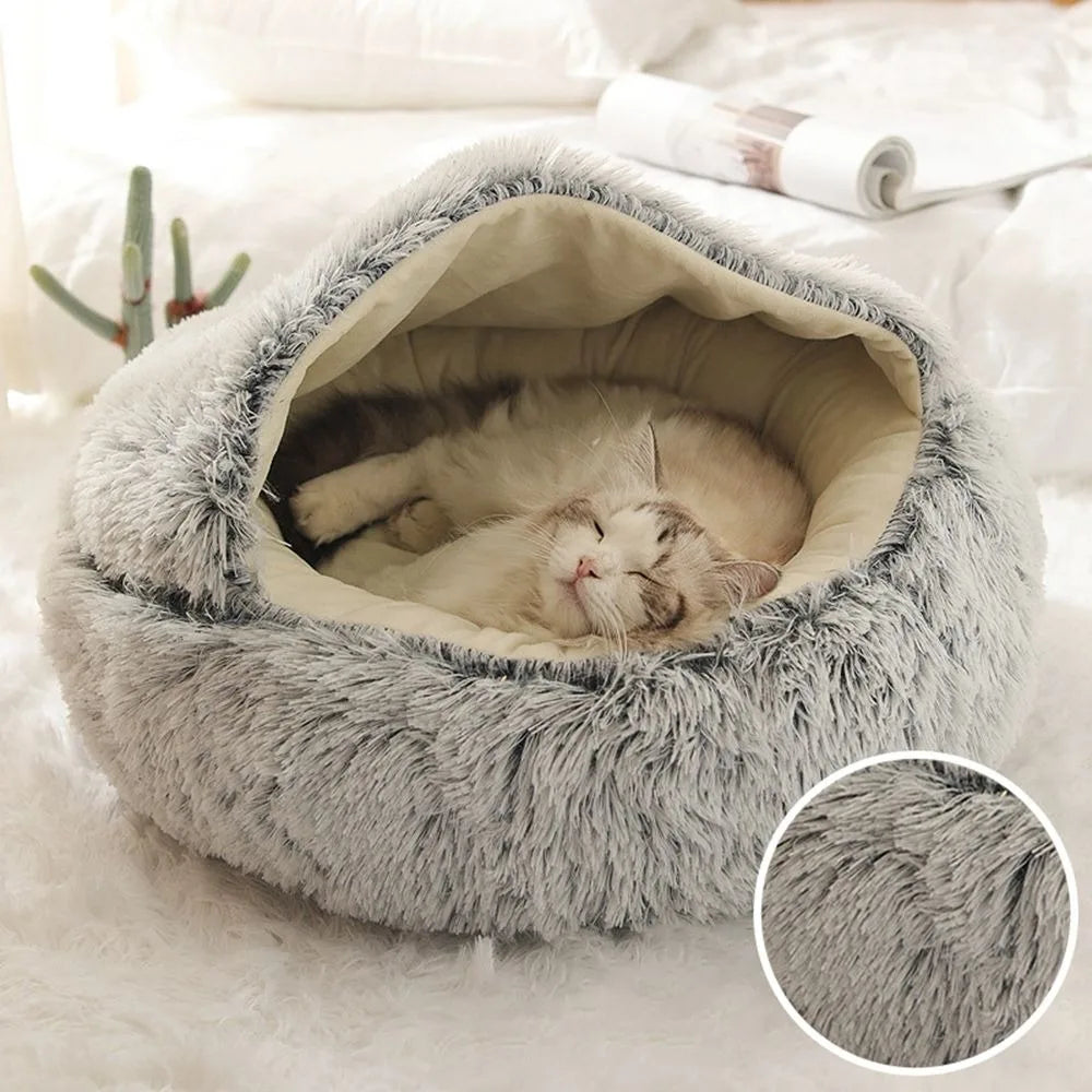 Cat sleeping in grey cloud pet bed