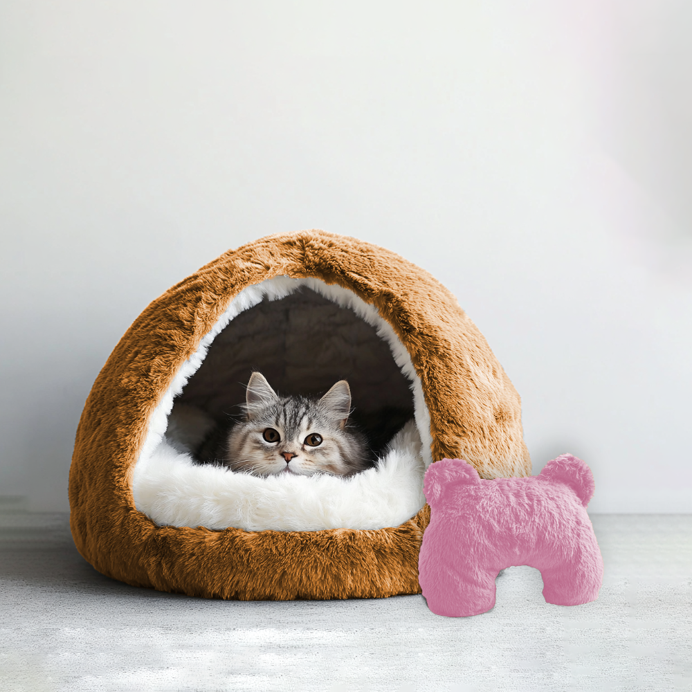 Brown cave pet bed and pink u shaped pet calming pillow